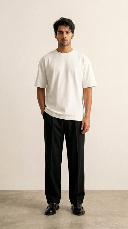 Hallberd Oversized Plain T-Shirt in white, front view, relaxed fit with black tailored trousers