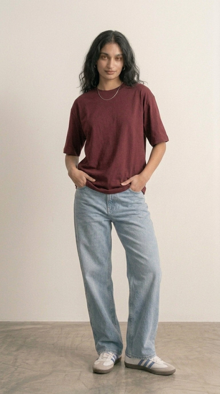 Hallberd Women's Oversized T-Shirt in maroon, front view, relaxed fit with light-wash jeans